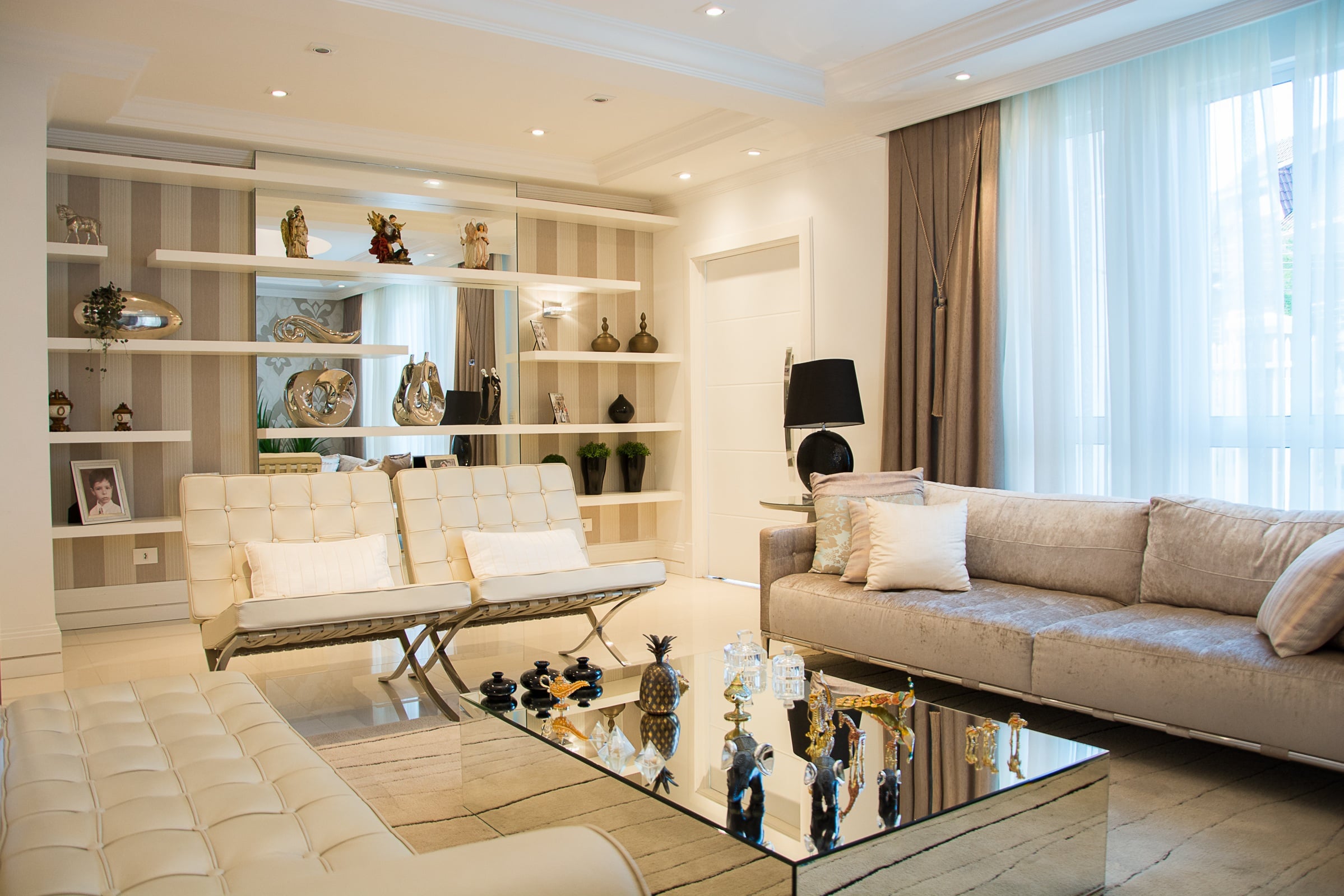Premium Stayvera living room with sofa and warm natural light